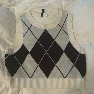 White and black sweater vest